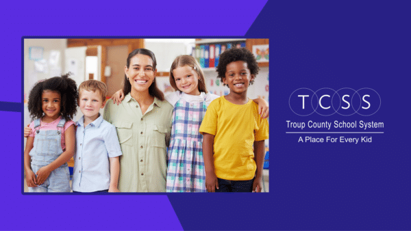 Female teacher with four young students next to the text 