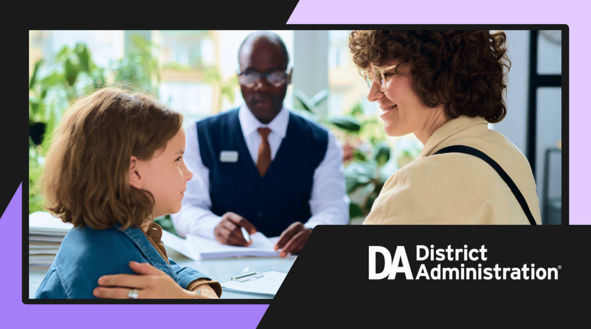 Woman in glasses comforting a young female student with male counselor in the background. District Administration logo on bottom right.