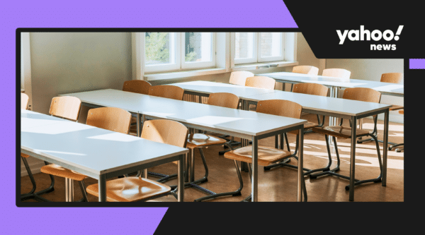 Classroom of empty desks. Yahoo! logo on top right.